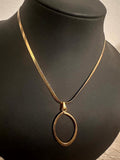 Collier doré - pendentif ovale